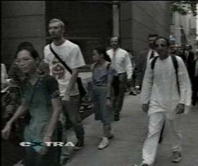 Catherine Cheng and Larry Gross outside St. Peter's Church